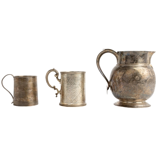 485 - A LARGE GEORGE III WHITE METAL ENGRAVED JUG, LONDON Together with a christening mug with three engra... 