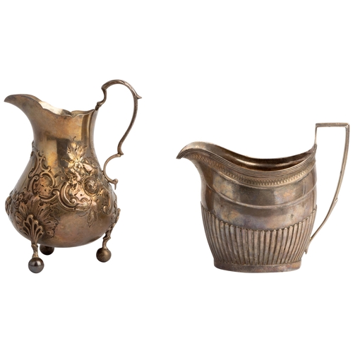 486 - A LARGE GEORGE III HALF FLUTED CREAM JUG, LONDON 1803 Together with a large baluster shape embossed ... 