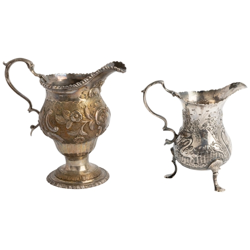 487 - A LARGE GEORGE III CHASED AND FLUTED CREAM JUG, LONDON 1770 Together with another small chased cream... 