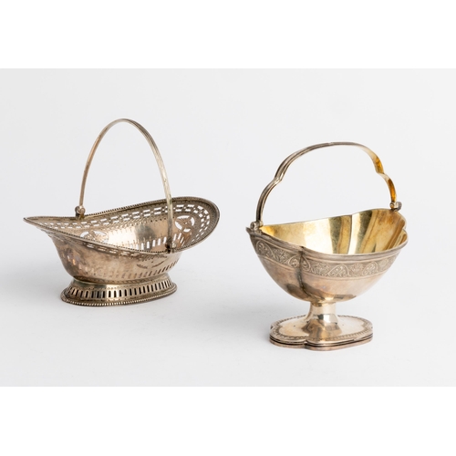 491 - A GEORGE III PIERCED SWING HANDLE BASKET, LONDON 1785 Together with another shaped oval swing handle... 