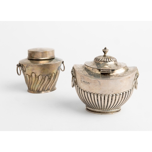 510 - A HALF FLUTED TEA CADDY WITH RING HANDLES, LONDON 1912 Together with another half fluted caddy with ... 