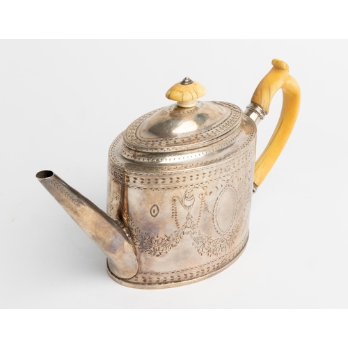 515 - A GEORGE III OVAL TEAPOT WITH ENGRAVED DECORATION, LONDON 178527 cm.476 g.