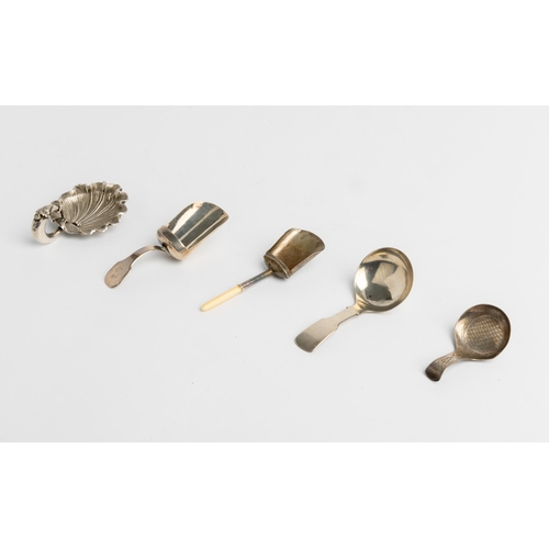 525 - A SHELL BOWL CADDY SPOON WITH LOOP HANDLE, BIRMINGHAM 1875 Together with four Birmingham made caddy ... 