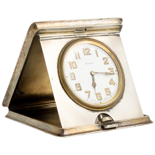 553 - A SQUARE ENGINE TURNED EIGHT DAY TRAVEL CLOCK, BIRMINGHAM 1945.9.5 cm.