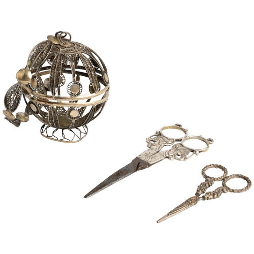 371 - A SILVER FILIGREE YARN BALL WITH BRACELET, GERMAN? C.1860 Together with a pair of silver mounted sci... 