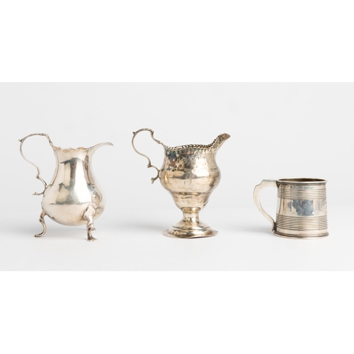 574 - A BALUSTER SHAPE CREAM JUG, LONDON 1762 Together with another similar jug, London 1776 and a reeded ... 