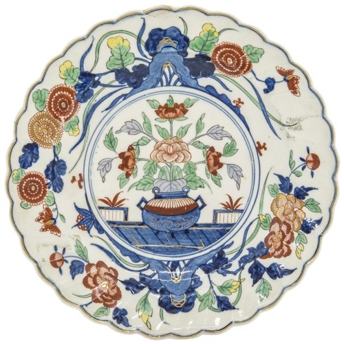 1204 - A CHELSEA-DERBY IMARI 'REPLACEMENT' PLATEMid 18th century in Imari taste made as a replacement, 22.5... 