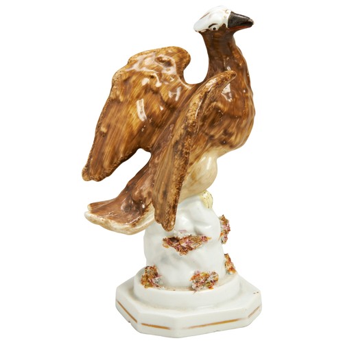 1187 - A PEARLWARE FIGURE OF AN EAGLE ON ROCKY BASECirca 1840, 19cms high