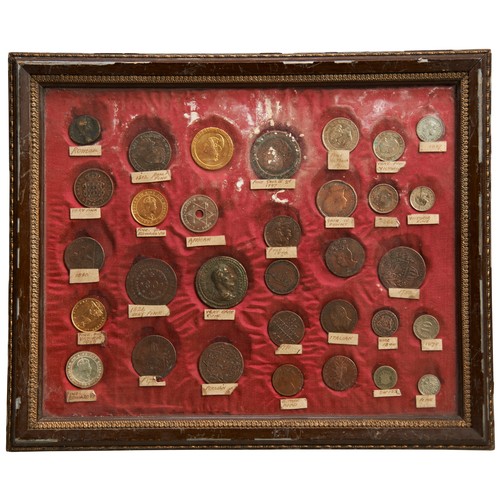 324 - A BARBADOS GIII PENNY TOKEN ‘I SERVE’ MOUNTED IN A FRAME with various other coins and tokens with ol... 