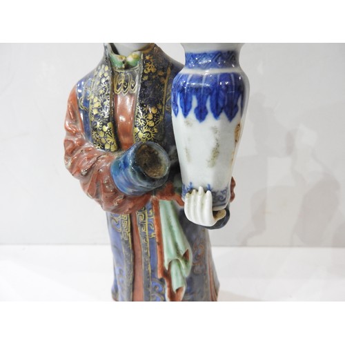 1996 - A CHINESE NODDING-HEAD FIGURE OF A COURT LADY CANDLE HOLDERQIANLONG PERIOD (1736-1795)the standing f... 