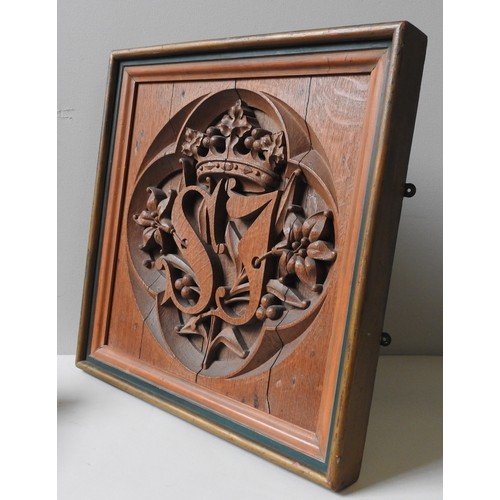 590 - A 19TH CENTURY CARVED OAK QUATREFOIL PANEL, the interior carved with the initials S.J, surmounted by... 