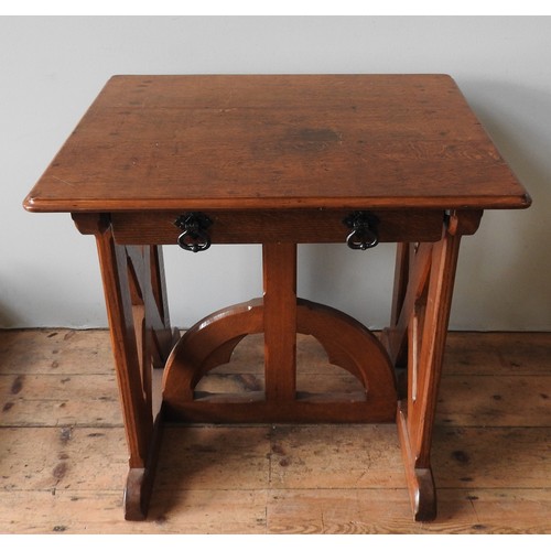 80 - ATTRIBUTED TO A.W.N PUGIN, A GOTHIC OAK WRITING TABLE, CIRCA 1840, moulded edge rectangular top abov... 