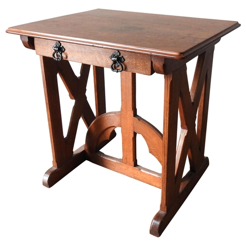 80 - ATTRIBUTED TO A.W.N PUGIN, A GOTHIC OAK WRITING TABLE, CIRCA 1840, moulded edge rectangular top abov... 