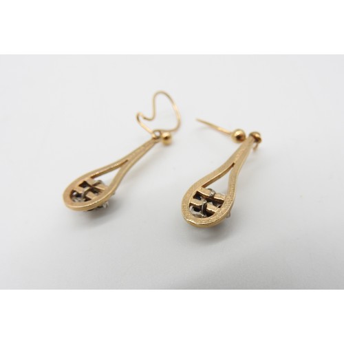 567 - A PAIR OF GOLD SAPPHIRE AND DIAMOND SET DROP EARRINGS, the elongated teardrop form gold earrings set... 