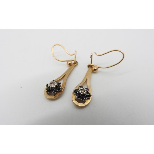 567 - A PAIR OF GOLD SAPPHIRE AND DIAMOND SET DROP EARRINGS, the elongated teardrop form gold earrings set... 