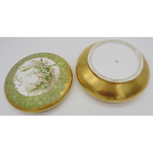 309 - A LATE 19TH/EARLY 20TH CENTURY LIMOGES GILDED POT AND COVER, the cover hand painted with lily of the... 