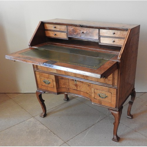 73 - A WALNUT CROSS-BANDED BUREAU, EARLY 20TH CENTURY, the fall-front panel opening to reveal a compartme... 