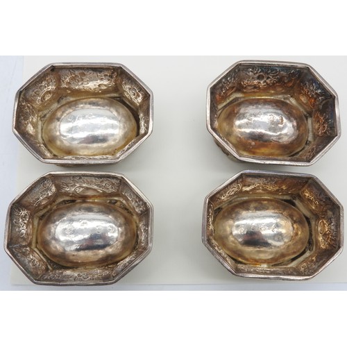 515 - A SET OF FOUR WHITE METAL TRENCHER SALTS, PROBABLY LAST QUARTER 18TH CENTURY, octagonal tapering for... 