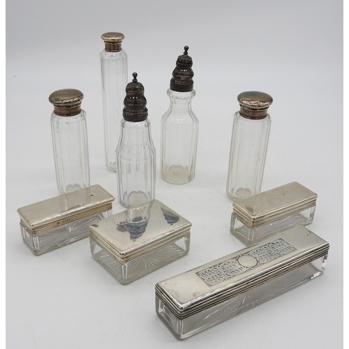 508 - A GROUP OF SILVER MOUNTED TOILETTE BOXES AND TWO CRUET BOTTLES, one of the toilette boxes with a pus... 