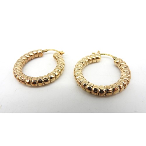 571 - A PAIR OF ITALIAN SILVER GILT HOOP EARRINGS, graduated bobbin form, stamped 'Italy 925'5 grams