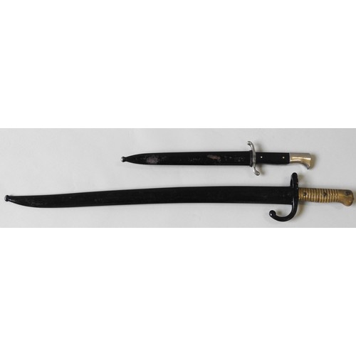 210 - A FRENCH CHASSEPOT SWORD BAYONET AND A GERMAN SECOND WORLD WAR DRESS BAYONET, the blade of the Frenc... 