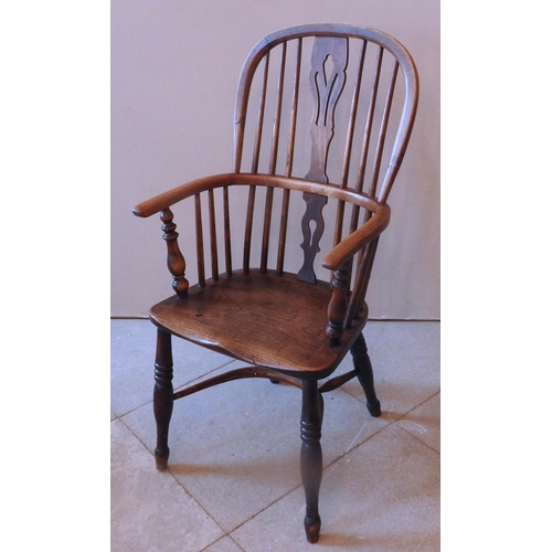 50 - A GROUP OF THREE NEAR MATCHED EARLY 19TH CENTURY WINDSOR CHAIRS, all with pierced splats over elm sa... 