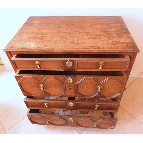 49 - AN OAK GEORGE III CHEST OF DRAWERS IN THE JACOBEAN STYLE, CIRCA 1780, rectangular form with an array... 