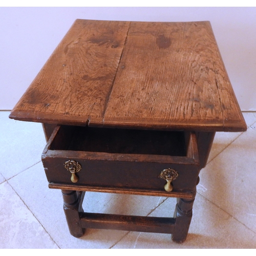 84 - AN 18TH CENTURY OAK SIDE TABLE, rectangular top over single end frieze drawer raised on turned balus... 