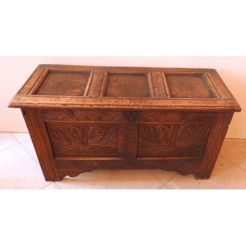 87 - A CHARLES II OAK PANELLED COFFER, CIRCA 1655, the hinged rectangular top inscribed with the date 165... 