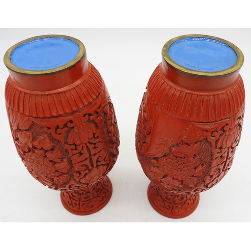 286 - A PAIR OF CINNABAR LACQUER ENAMELLED VASES, simple baluster form, the sides decorated with blossomin... 