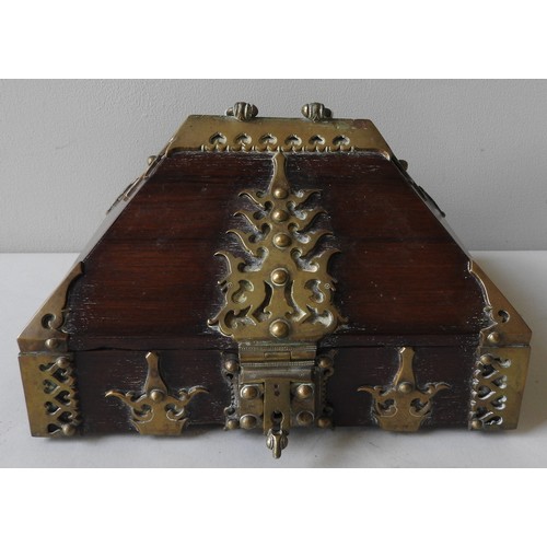 479 - AN INDIAN CASKET, KERALA, SOUTH INDIA, the pyramid shaped top with swing handle, the whole decorated... 