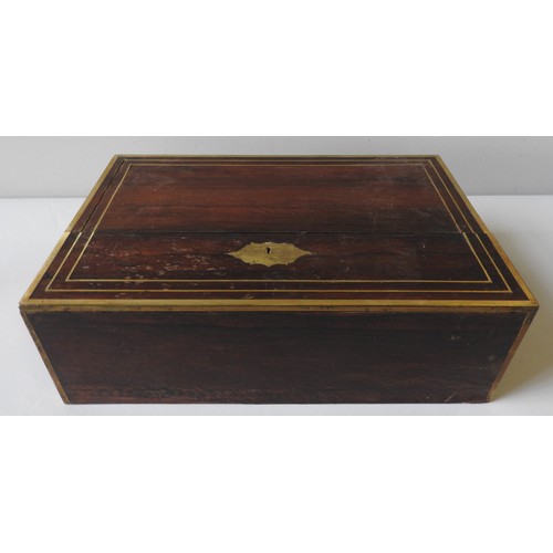 477 - A LARGE VICTORIAN BRASS BOUND ROSEWOOD WRITING SLOPE, the fold-over front revealing a rise and fall ... 