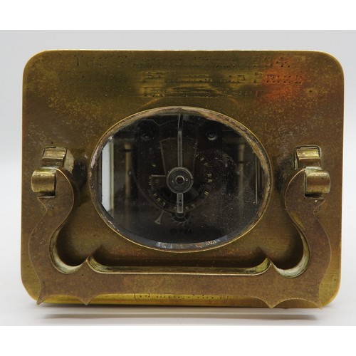 142 - A FRENCH BRASS CASED CARRIAGE CLOCK, CIRCA 1904, by R & Co. Paris, the top inscribed with a dedi... 