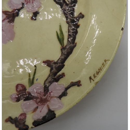 329 - A VINTAGE THEODORE DECK PLATE, CIRCA 1910, hand painted with a cherry blossom design on a pale yello... 