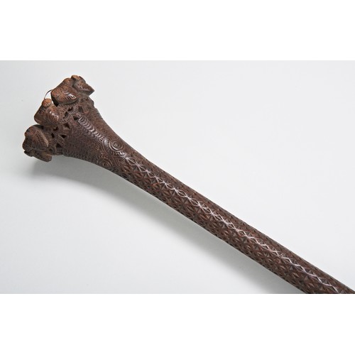 248 - A RARE AUSTRAL ISLANDS CEREMONIAL PADDLE, the pommel carved with representations of human heads, the... 