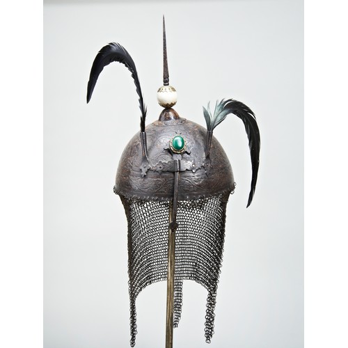 226 - AN INDO/PERSIAN KHULA KHUD, the steel casque with foliate and animal decoration, plume holders, nose... 