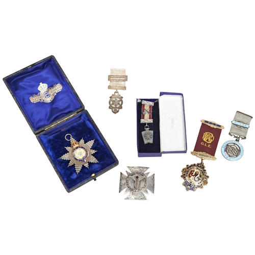 486 - A SILVER MASONIC MEDAL,  Lodge No. 446, various other medals, a sash and a rule book.Provenance:from... 