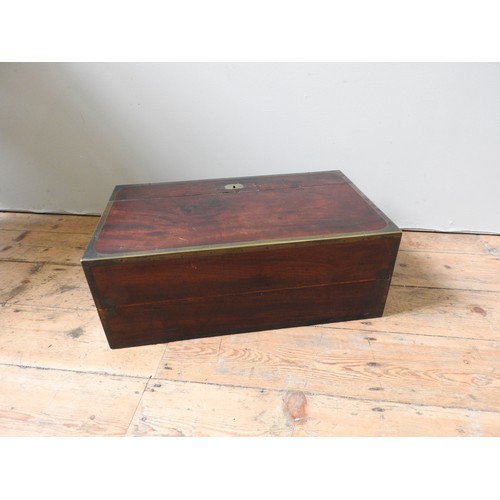 484 - A LARGE BRASS BOUND MAHOGANY CAMPAIGN WRITING SLOPE with a lift out interior revealing an arrangemen... 