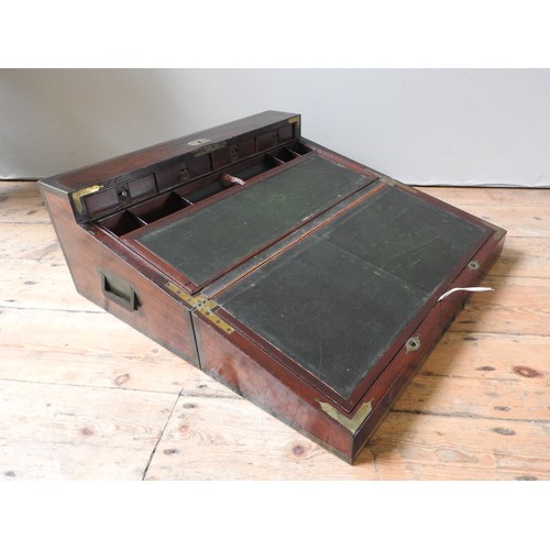 484 - A LARGE BRASS BOUND MAHOGANY CAMPAIGN WRITING SLOPE with a lift out interior revealing an arrangemen... 