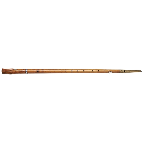 609 - A RARE MUSICAL WALKING CANE fashioned as a woodwind instrument the shaft hollowed and punctuated wit... 