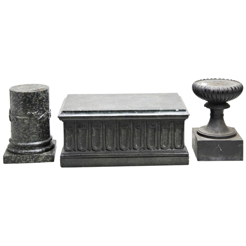 624 - A LARGE RECTANGULAR FLUTED SERPENTINE PLINTH, a circular serpentine plinth, a turned slate and lobed... 