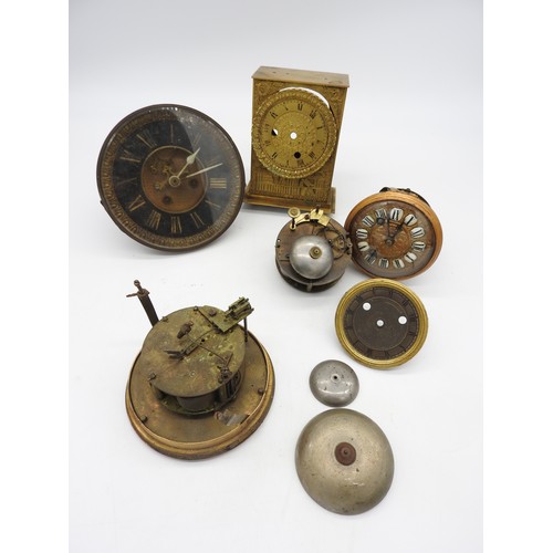 129 - FOUR FRENCH MOVEMENTS. One with silk suspension, a silvered dial with bezel and a section of case wi... 