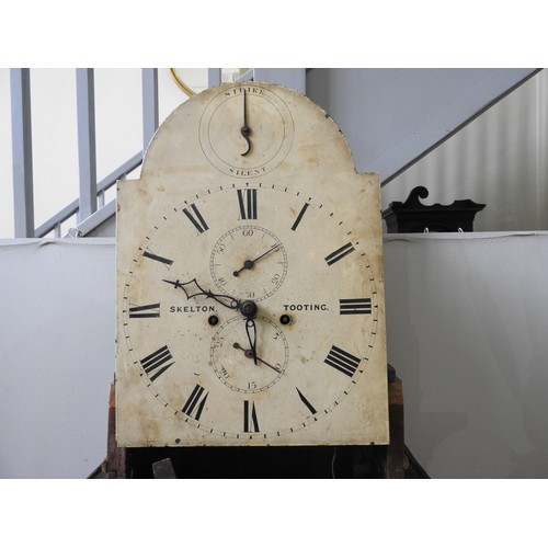 118 - AN 8 DAY OAK LONGCASE CLOCK the 12 inch painted dial signed Skelton Tooting, subsidiary seconds and ... 