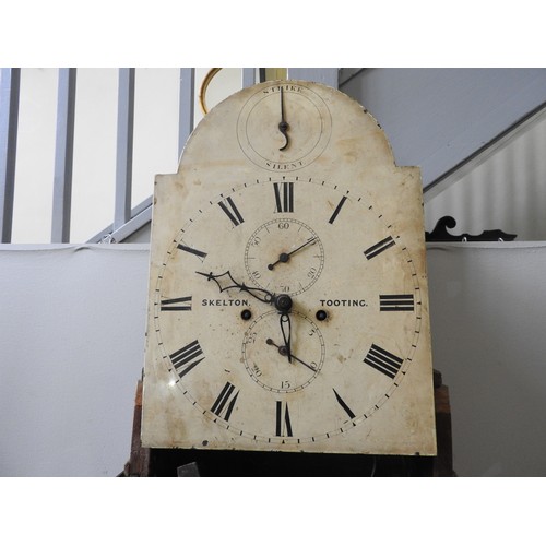 118 - AN 8 DAY OAK LONGCASE CLOCK the 12 inch painted dial signed Skelton Tooting, subsidiary seconds and ... 