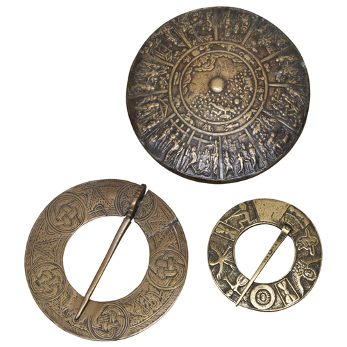 676 - A COPPER ALLOY CIRCULAR PLAQUE COMPARTMENTALISED INTO THE SIGNS OF THE ZODIAC, a Celtic style copper... 