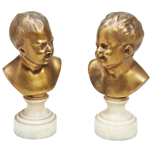 646 - AFTER JEAN ANTIONE HOUDON, LAUGHING GIRL, CRYING BOY, GILT BRONZE BUSTS ON WHITE ONYX BASES.17 cmsPr... 