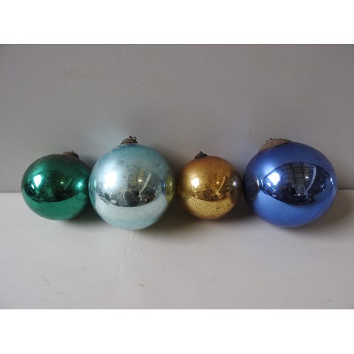 648 - A BLUE 'WITCHES' BALL WITH SUSPENSION LOOP, ANOTHER IN LIGHTER BLUE AND TWO SMALLER IN GOLD AND GREE... 