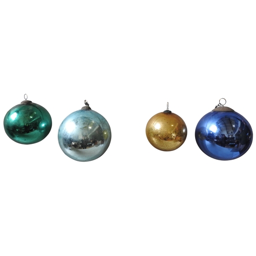 648 - A BLUE 'WITCHES' BALL WITH SUSPENSION LOOP, ANOTHER IN LIGHTER BLUE AND TWO SMALLER IN GOLD AND GREE... 