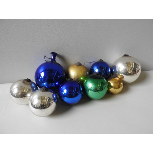 649 - A BLUE 'WITCHES' BALL WITH AN ELONGATED NECK AND EIGHT OTHERS SMALLER IN ASSORTED COLOURS.18 cms max... 