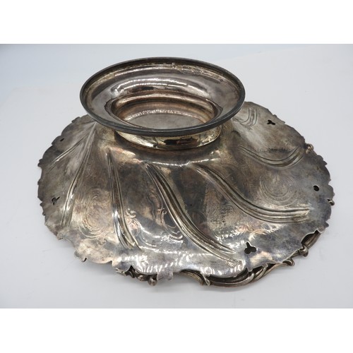 557 - A GOOD VICTORIAN SILVER SWING-HANDLED BASKET; of ornate compartmental form on a raised foot, hallmar... 